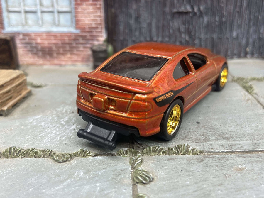 Custom Hot Wheels - 2006 Pontiac GTO - Burnt Orange - Gold 5 Spoke Racing Wheels - Rubber Tires