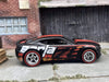 Custom Hot Wheels 2016 Chevy Camaro SS In Black and Red With Borla Livery With Chrome 5 Spoke Race Wheels With Redline Rubber Tires