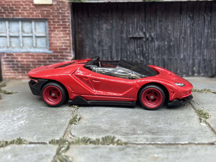 Red Lamborghini Centenario Roadster custom Hot Wheels with red wheels, view 1