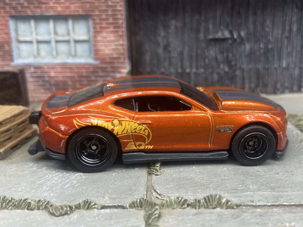 Front three-quarter view of orange-and-black 2018 Camaro COPO custom Hot Wheels