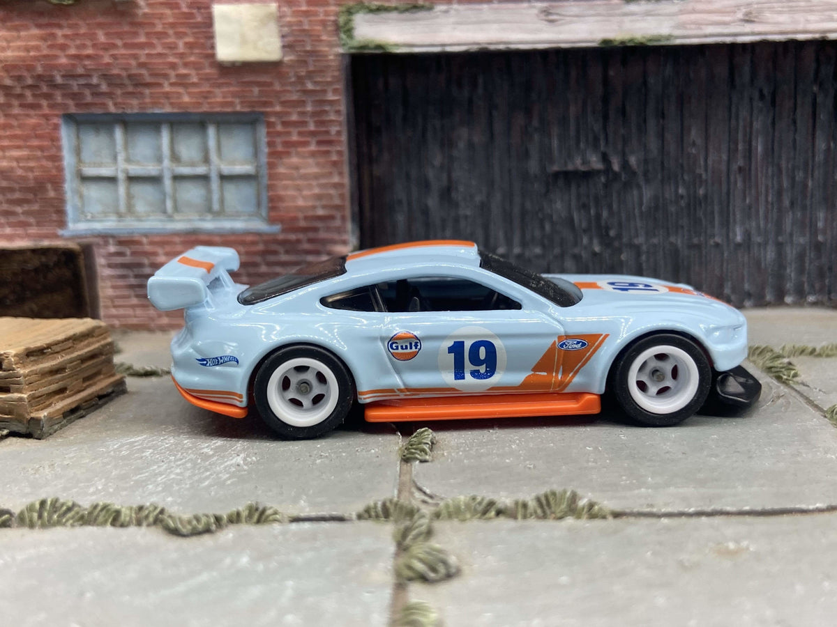 Front three-quarter view of Gulf-color 2018 Ford Mustang GT custom Hot Wheels