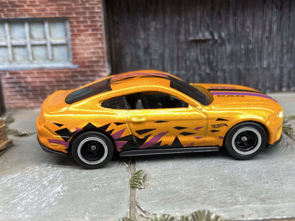 Front three-quarter view of orange 2018 Mustang GT custom Hot Wheels