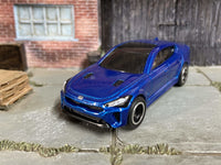 2019 Kia Stinger GT custom Hot Wheels, blue with black and chrome wheels, view 2