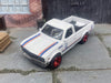 Custom Hot Wheels Datsun 620 Mini Truck In White and Red With Red 5 Star Wheels With Rubber Tires
