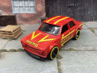 Datsun BlueBird 510 custom Hot Wheels, MOMO red, yellow-line tires, view 2