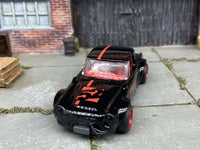 Black Fairlady 2000 custom Hot Wheels with red 4-spoke wheels — view 4