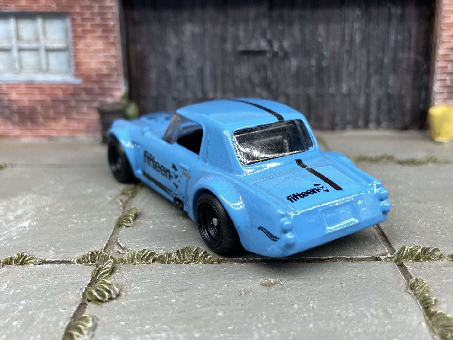 Custom Hot Wheels Fairlady 2000 In Blue and Black With Black 4 Spoke Wheels With Rubber Tires