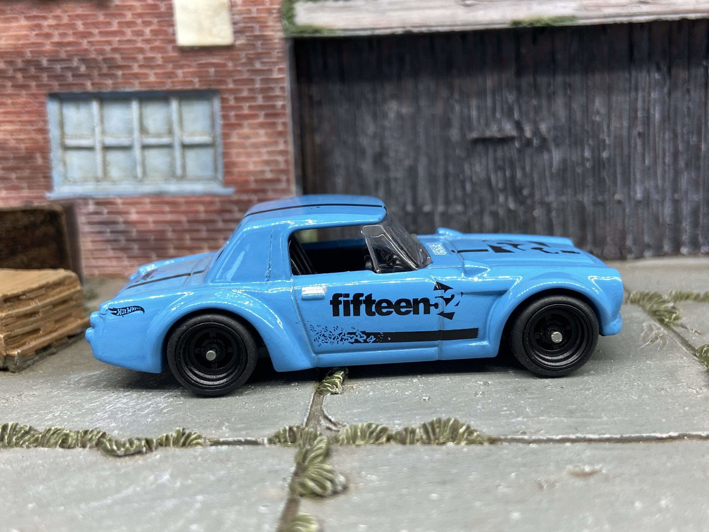 Custom Hot Wheels Fairlady 2000 In Blue and Black With Black 4 Spoke Wheels With Rubber Tires