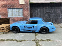 Blue-and-black Fairlady 2000 custom Hot Wheels — view 3