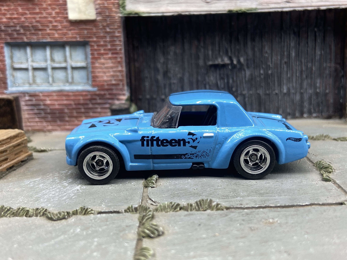 Fairlady 2000 custom, blue and black, chrome wheels, view 1