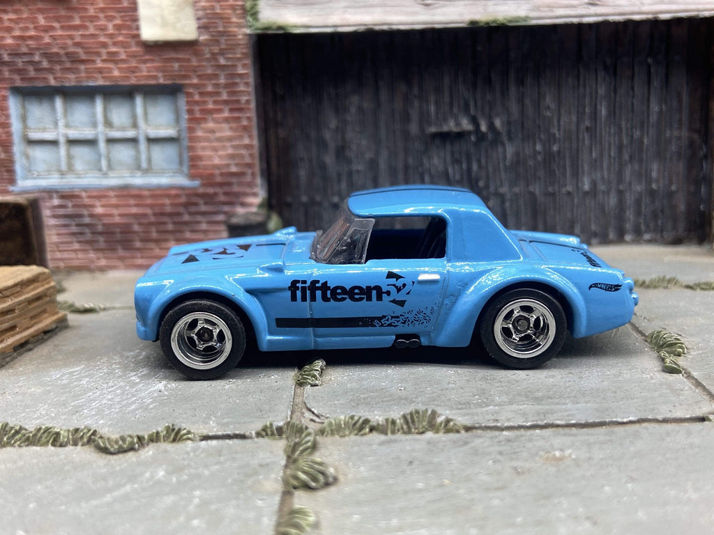 Custom Hot Wheels Fairlady 2000 In Blue and Black With Chrome Deep Dish 5 Spoke Wheels With Rubber Tires