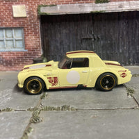Custom Hot Wheels Fairlady 2000 In Yellow and Red With Black and Gold Race Wheels With Rubber Tires