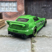 Custom Hot Wheels Honda S2000 in Green With Black and Green 6 Spoke Studded Racing Wheels With Rubber Tires