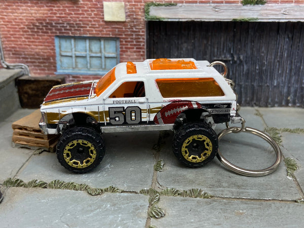 Chevy Blazer 4X4 Football Livery custom Hot Wheels keychain in white red and gold