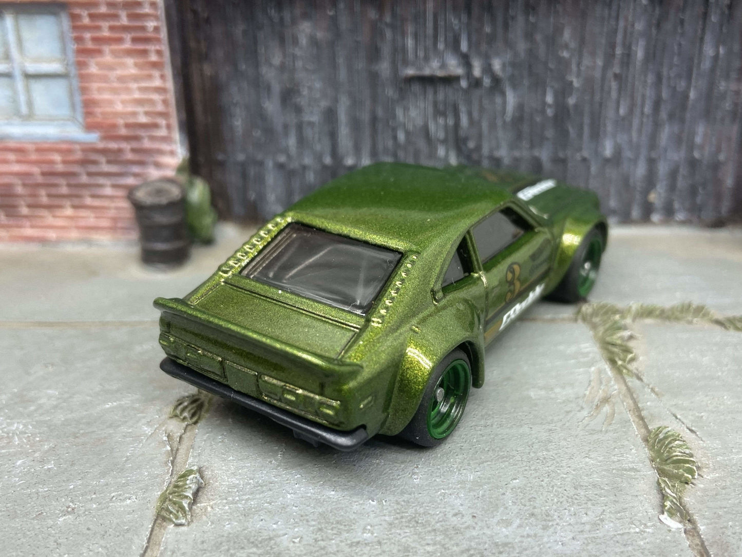 Custom Hot Wheels Mazda RX-3 In Green With Green 4 Spoke Race Wheels With Rubber Tires