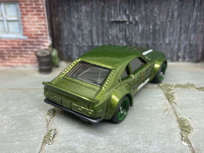 Custom Hot Wheels Mazda RX-3 In Green With Green 4 Spoke Race Wheels With Rubber Tires
