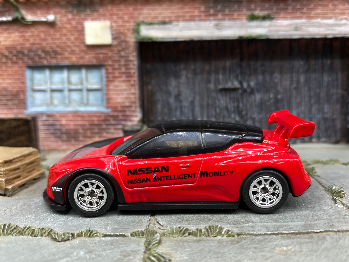 Custom Hot Wheels - Nissan Leaf Nismo - Red and Black - Chrome 12 Spoke Wheels - Rubber Tires