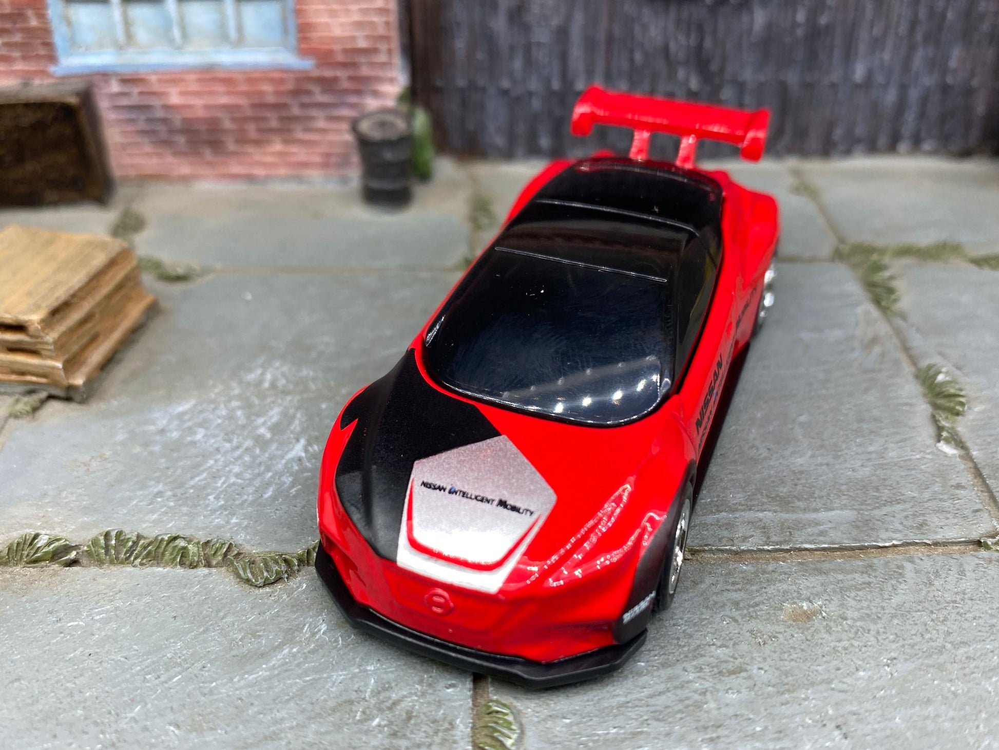 Custom Hot Wheels - Nissan Leaf Nismo - Red and Black - Chrome 12 Spoke Wheels - Rubber Tires