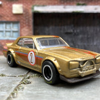 Custom Hot Wheels Nissan Skyline H/T 2000GT-X in Gold 2 with Chrome and Black Smooth Wheels with Firestone Rubber Tires