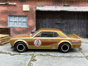 Custom Hot Wheels Nissan Skyline H/T 2000GT-X in Gold 2 with Chrome and Black Smooth Wheels with Firestone Rubber Tires
