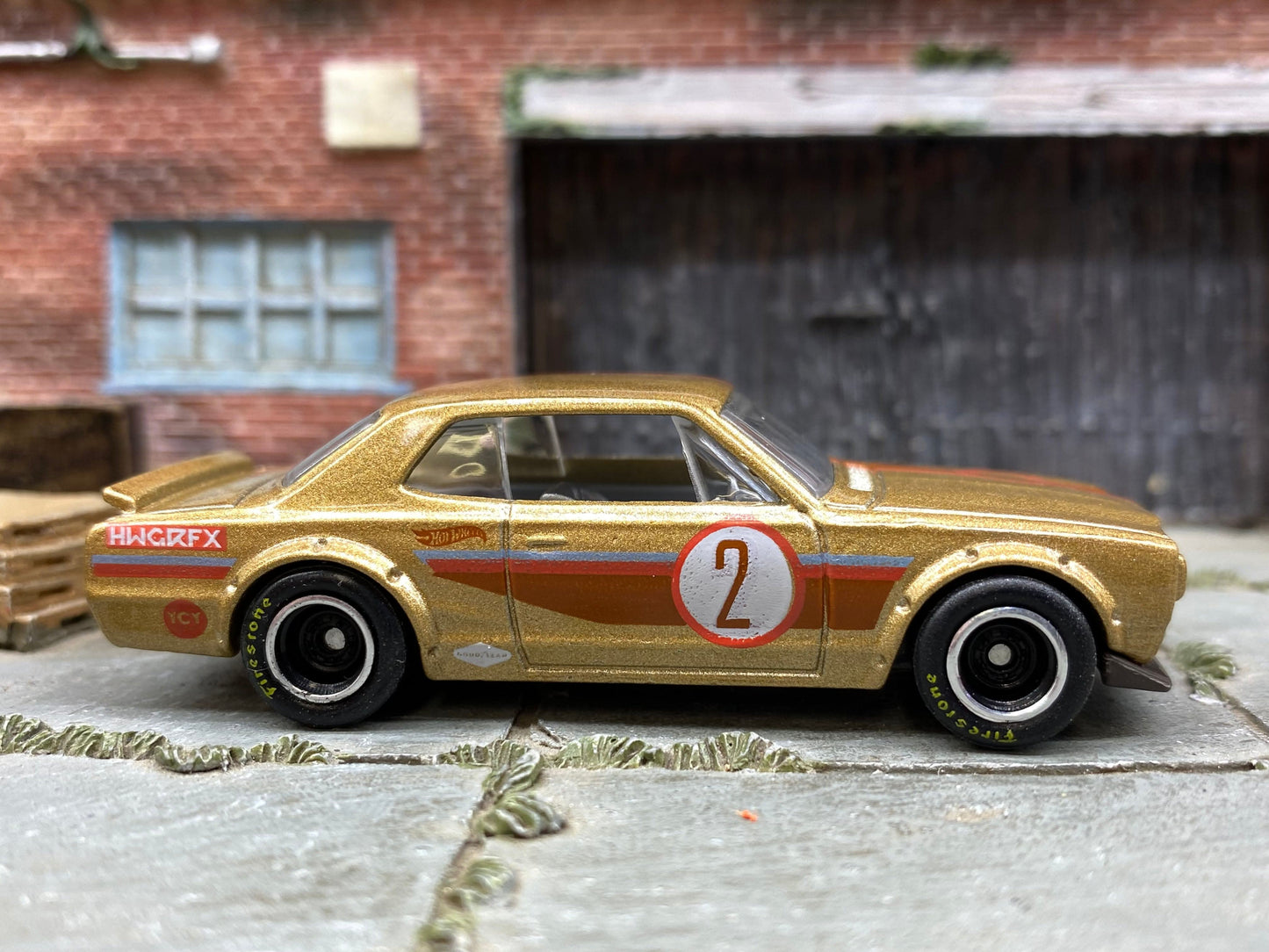 Custom Hot Wheels Nissan Skyline H/T 2000GT-X in Gold 2 with Chrome and Black Smooth Wheels with Firestone Rubber Tires