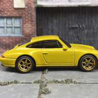 Custom Hot Wheels Porsche Carrera In Yellow With Gold 6 Spoke Studded Race Wheels With Rubber Tires