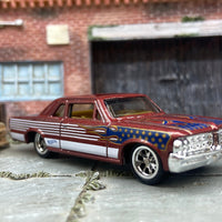 Custom Hot Wheels Stars and Stripes 1964 Pontiac GTO Dressed in Red, White and Blue with Chrome BBS Wheels with Rubber Tires