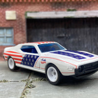 Custom Hot Wheels Stars and Stripes AMC Javelin AMX Dressed in Red, White and Blue with White 5 Star Wheels with Rubber Tires