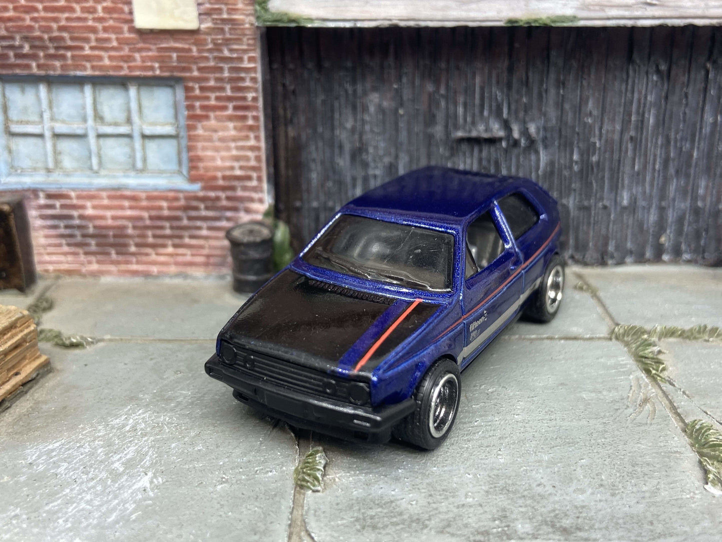 Custom Hot Wheels VW Volkswagen Golf MK2 In Blue and Black With Black And Chrome 5 Spoke Wheels With Rubber Tires