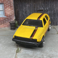 Custom Hot Wheels VW Volkswagen Golf MK2 In Yellow, Black and Orange With Black and Chrome 6 Spoke Studded Wheels and Rubber Tires