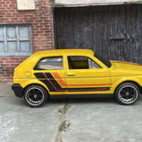 Custom Hot Wheels VW Volkswagen Golf MK2 In Yellow, Black and Orange With Black and Chrome 6 Spoke Studded Wheels and Rubber Tires