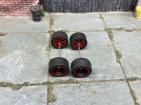 Alternate view of four 12mm black-and-red racing 5-spoke wheels with black rubber tires