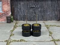 Alternate view of gold 5-star wheels with rubber tires