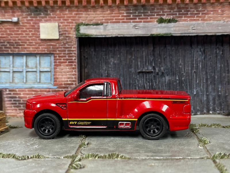 Custom Matchbox Ford F150 Lightning Red Black and Yellow SVT