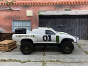 Custom Painted Hot Wheels Toyota Tacoma Off Road in Custom White Monster Energy Racing Livery With Green 5 Star Racing Wheels With off Road Rubber Tires