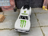 Custom Painted Hot Wheels Toyota Tacoma Off Road in Custom White Monster Energy Racing Livery With Green 5 Star Racing Wheels With off Road Rubber Tires