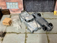 Rear view of bare-metal 1952 Chevy Stepside Pickup kit