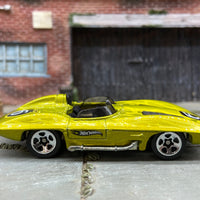 Loose Hot Wheels Chevy Corvette Stingray Dressed in Gold and Black