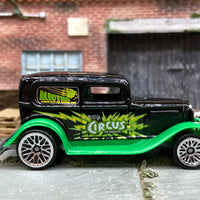 Loose Hot Wheels 1932 Ford Model A Sedan Dressed in Black and Green