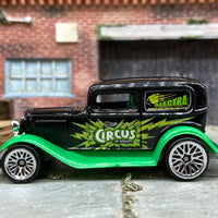 Loose Hot Wheels 1932 Ford Model A Sedan Dressed in Black and Green