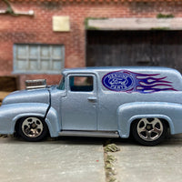 Loose Hot Wheels 1956 Ford F100 Panel Truck Dressed in Light Blue Ford Parts Livery