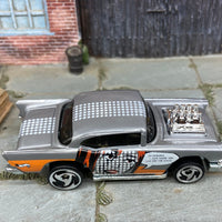 Loose Hot Wheels 1957 Chevy Dressed in Silver and Orange