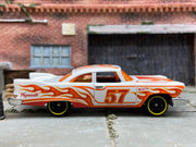 Loose Hot Wheels 1957 Plymouth Fury Dressed in White and Orange with Flames