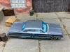 Loose Hot Wheels 1964 Chevy Impala Dressed in Light Blue with Graphics