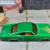 Loose Hot Wheels 1965 Chevy Impala Dressed in Green and Gold