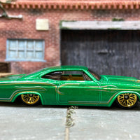 Loose Hot Wheels 1965 Chevy Impala Dressed in Green and Gold