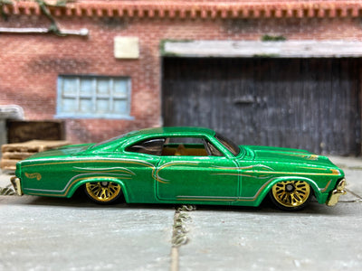 Loose Hot Wheels 1965 Chevy Impala Dressed in Green and Gold
