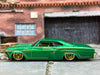 Loose Hot Wheels 1965 Chevy Impala Dressed in Green and Gold