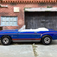 Loose Hot Wheels 1965 Ford Mustang Convertible Dressed in Blue, Red and White