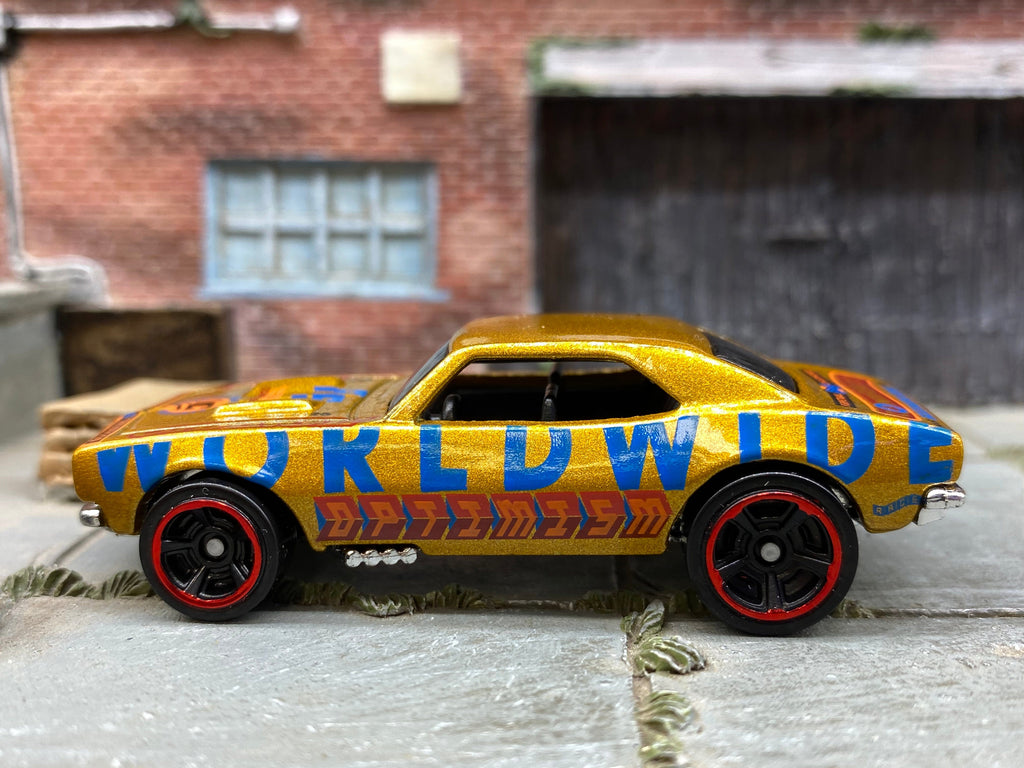 Loose Hot Wheels 1967 Chevy Camaro Dressed in Gold Worlwide Optimism Livery
